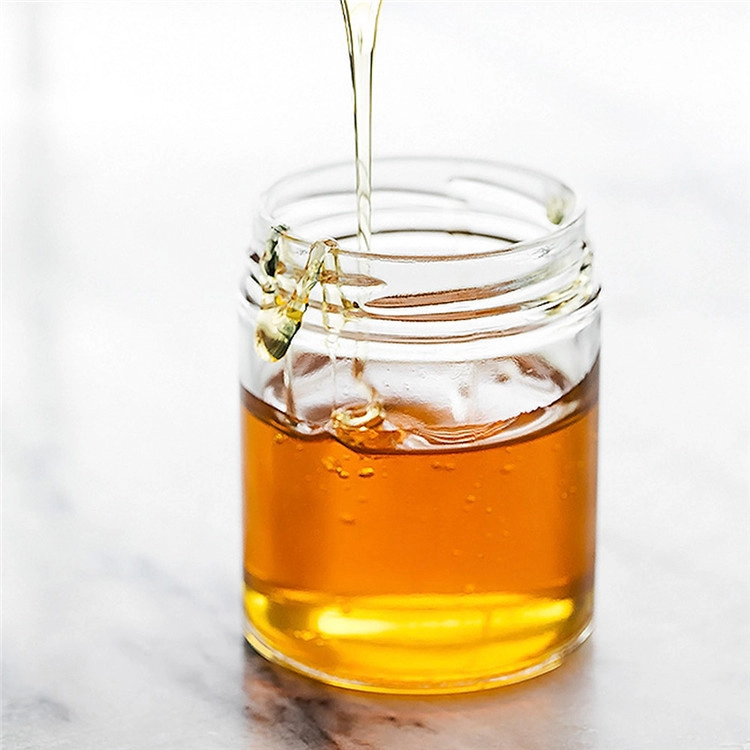 100% чистый натуральный мед из полевых цветов золотисто-янтарного цвета