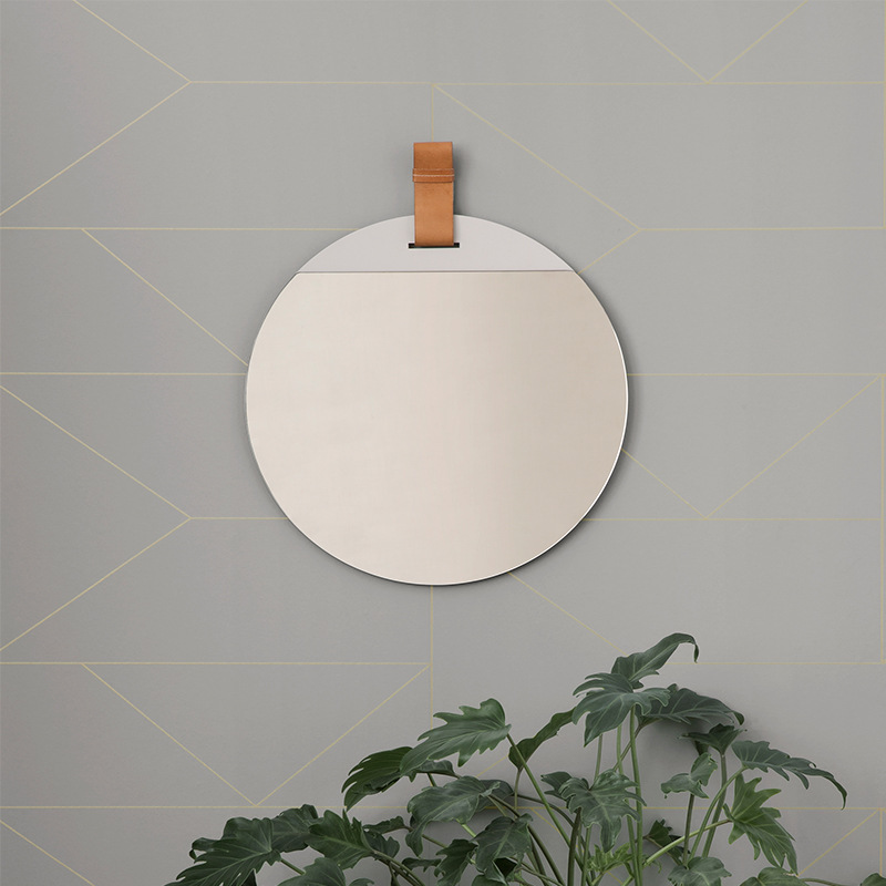 Black round metal wall mirror